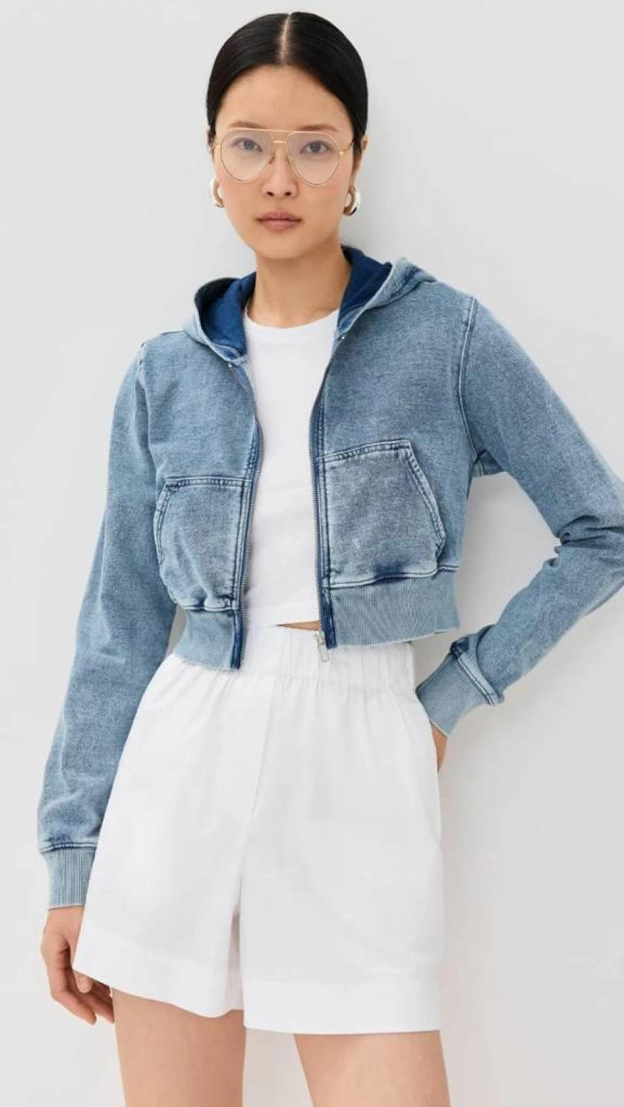 Good American Women's Jeanius Shrunken Zip Hoodie | Distressed Denim Jacket with Zip Front